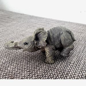 "The Herd Elephant Collection" by Martha Carey-Marty Sculptures.